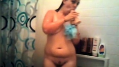 Hot chubby playing with dildo in the shower