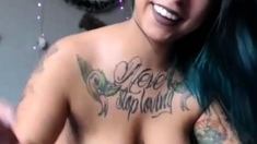 busty tattooed latin cam-slut