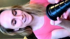 Mature blonde masturbates with sex toy in porn movie