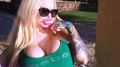 Blonde babe Kimberly enjoying her lovely big boobs