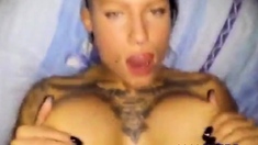 Big-Titted Amateur Tattooed Slut Sucks and Fucks