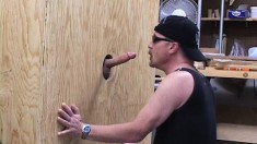 Butch looking biker dudes enjoy some hot glory hole cocksucking