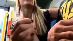 confident girlfriend gives nervous boyfriend blowjob on bus